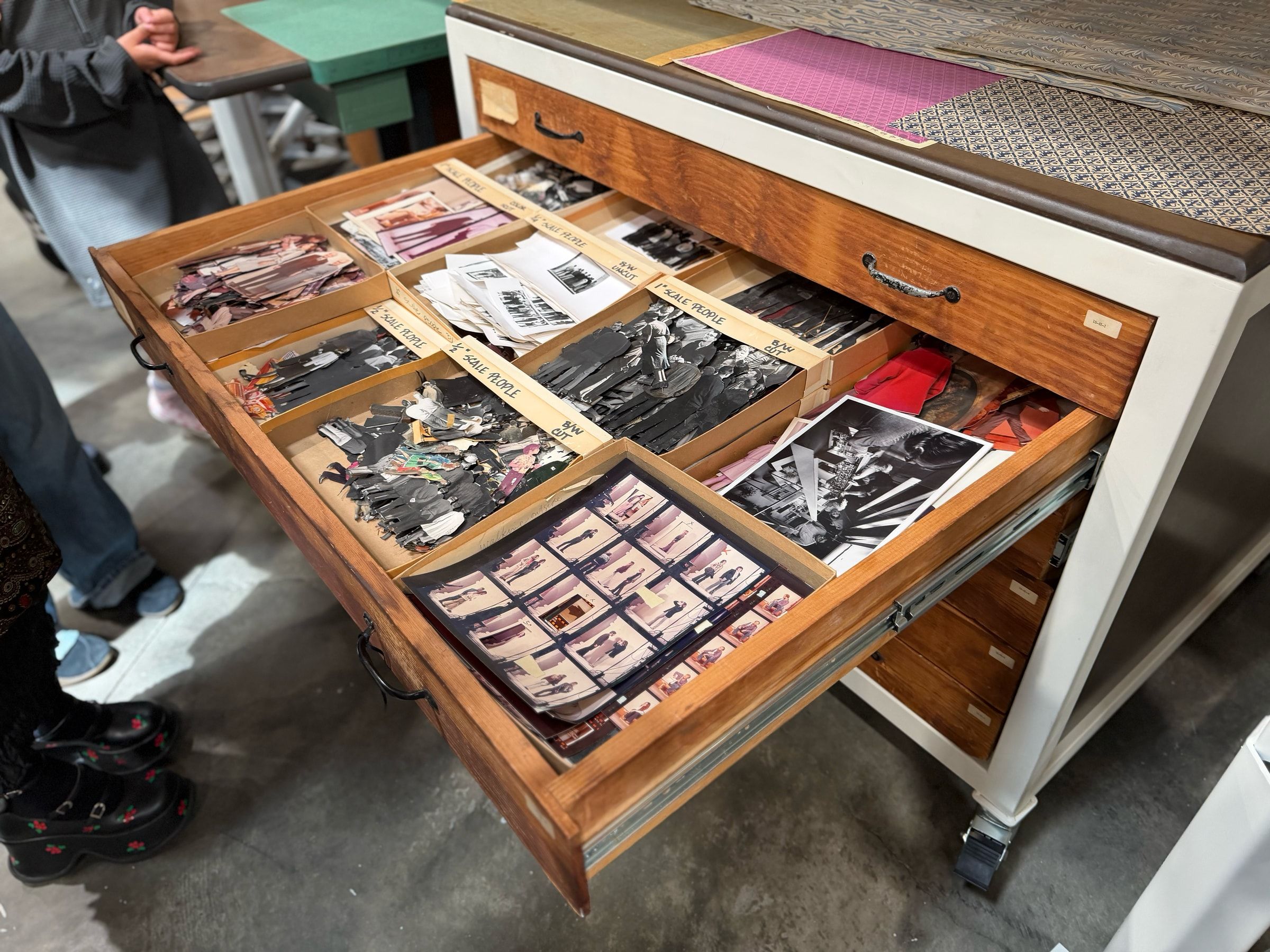 Photographs of people, used in exhibit design miniatures to show scale.